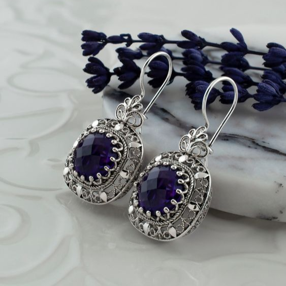 Brilliant blå krystaløreringe i vintage sølv