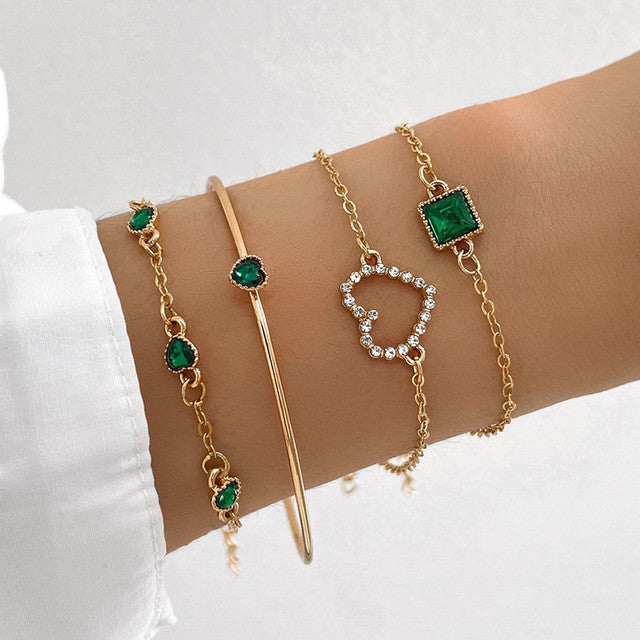 Armbåndspakke med grønne zirkonia i guld