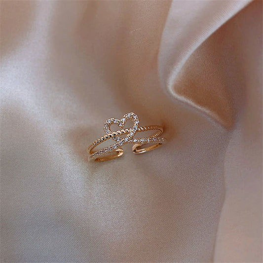 Justerbar ring med cubic zirconia hjerte i guld