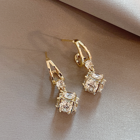 Elegante zirkonia-øreringe i guld