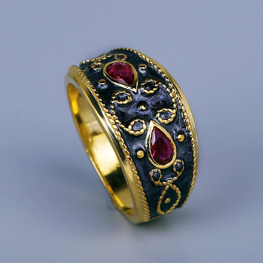 Vintage guldring med sort emalje